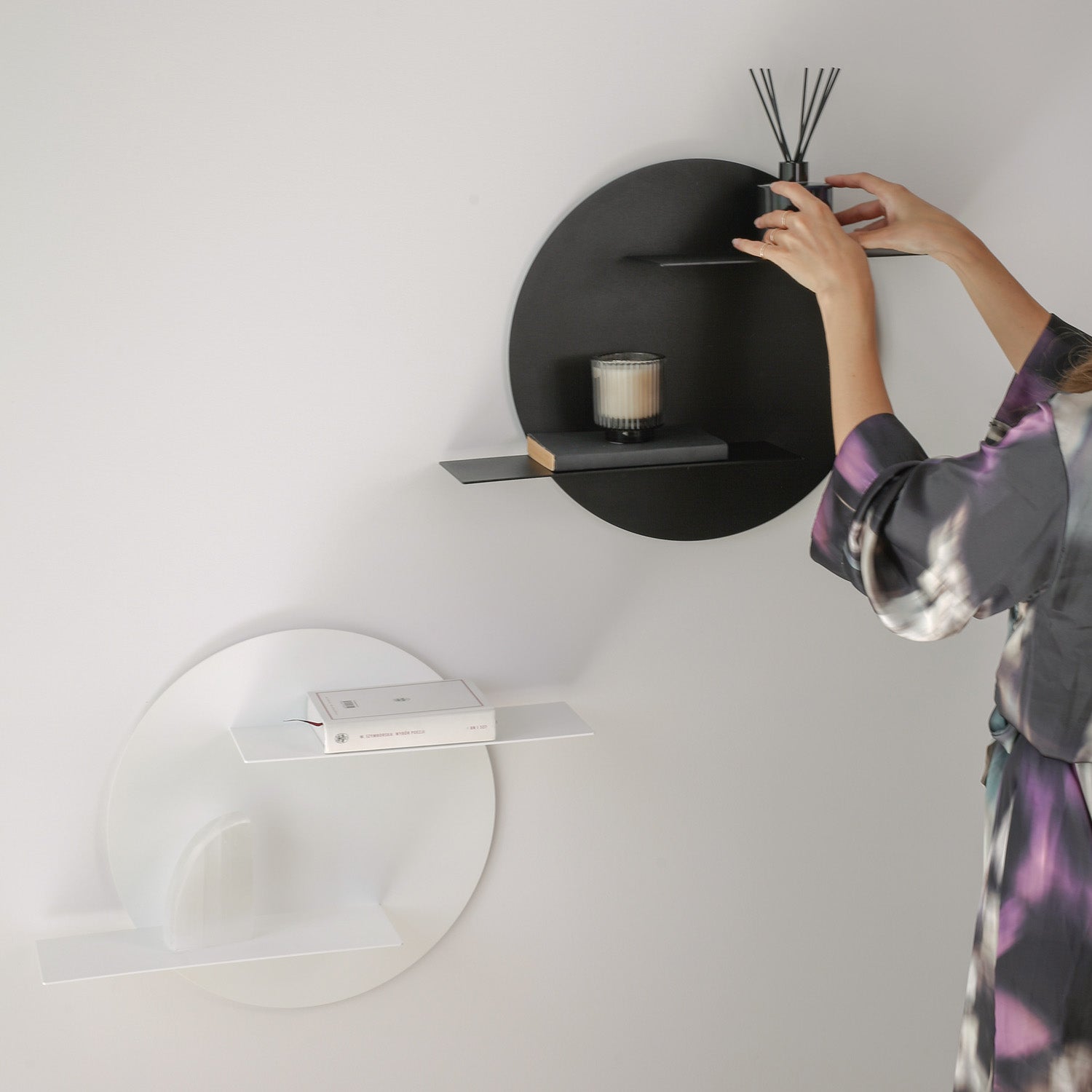 black and white modern wall decorative shelves with lady in bathrope