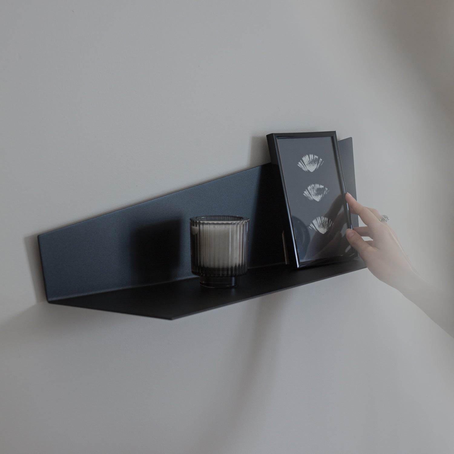 Minimalist modern wall shelf in black