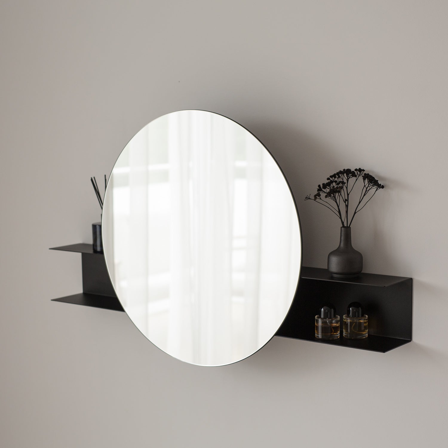black round wall mirror with shelf for bathroom storage