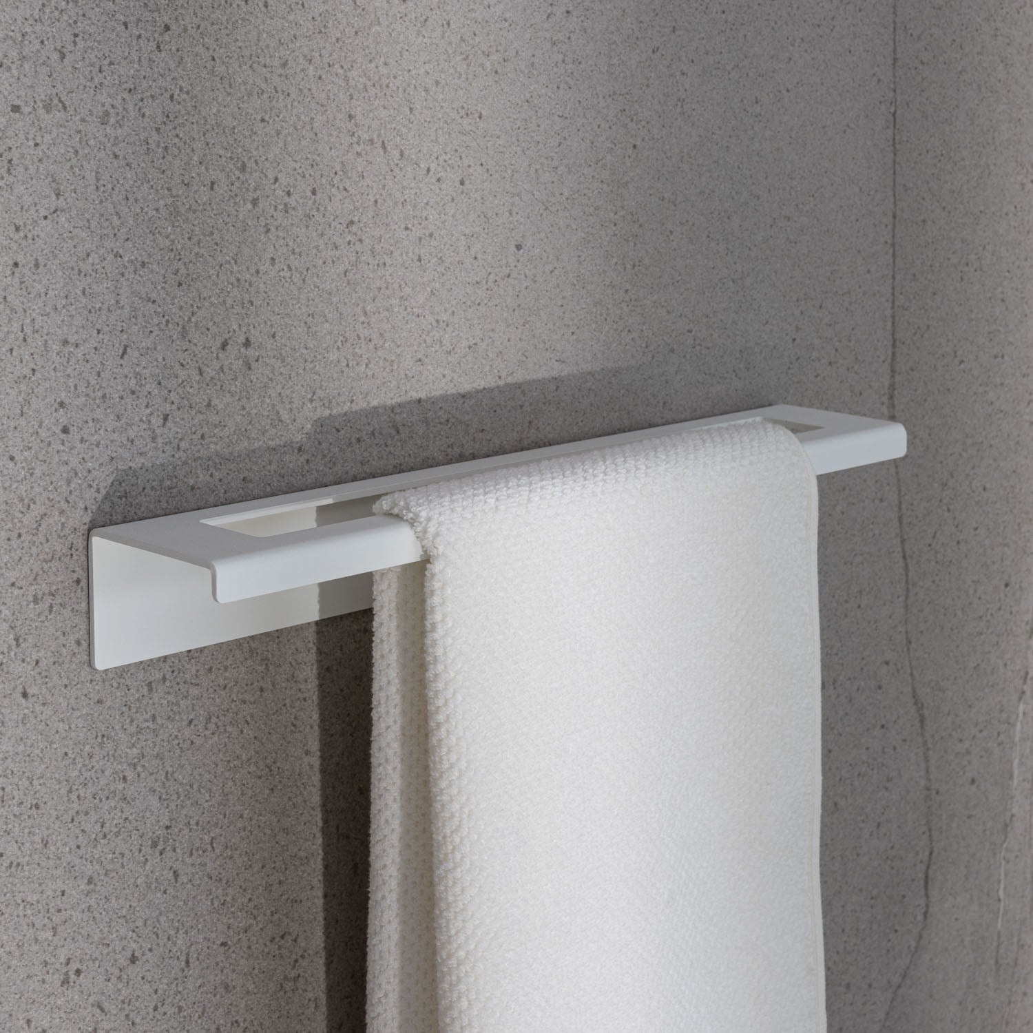 modern Towel rack drill free with a white towel on a gray wall